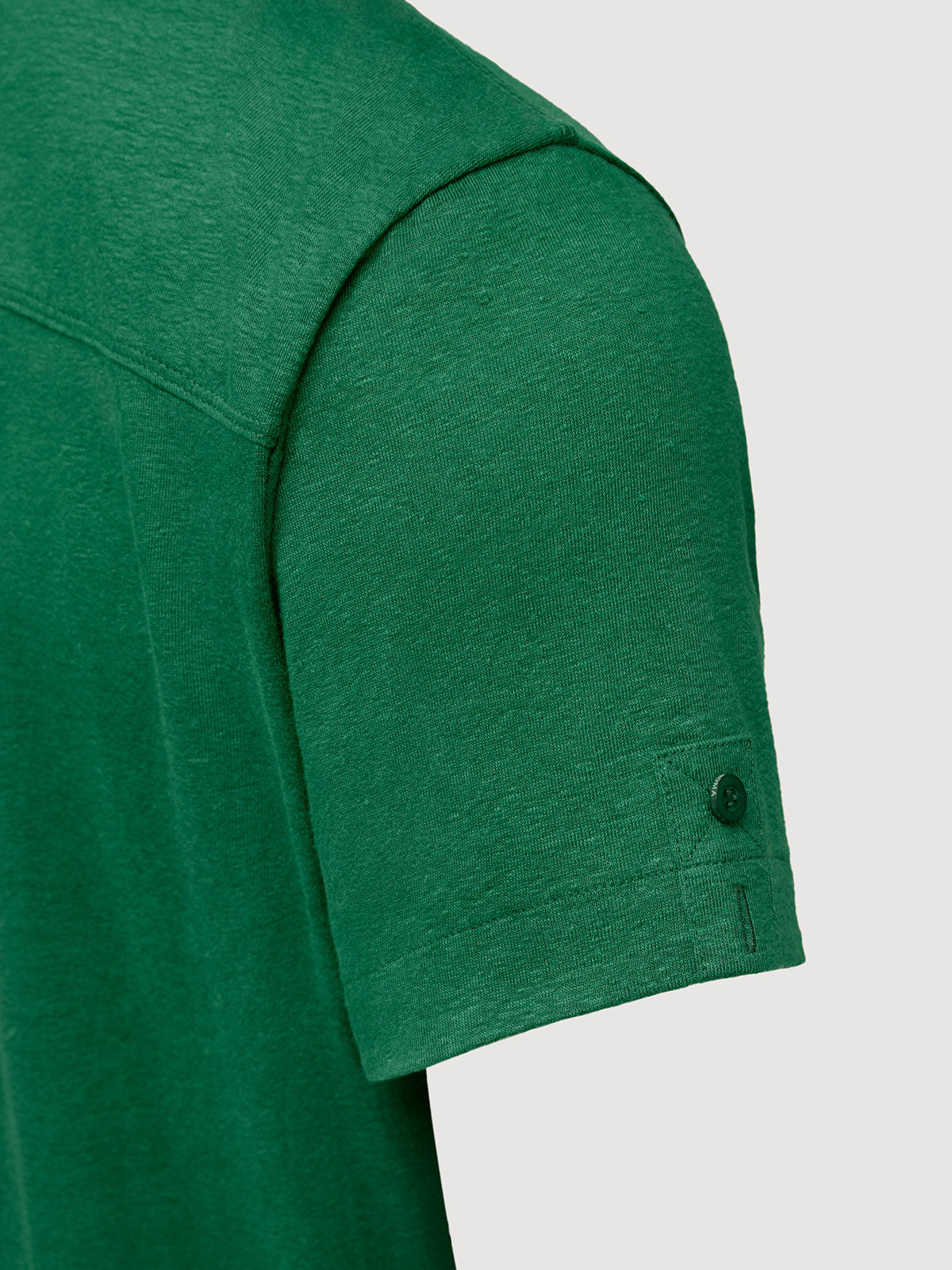 Madeira French Linen Short Sleeve Polo in *British Green* (forest green) — sleeve uncuffed detail | Y.Chroma