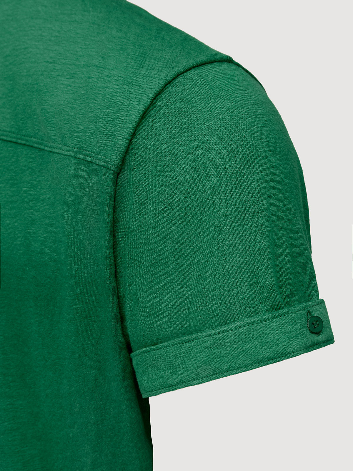 Madeira French Linen Short Sleeve Polo in *British Green* (forest green) — sleeve cuffed detail | Y.Chroma