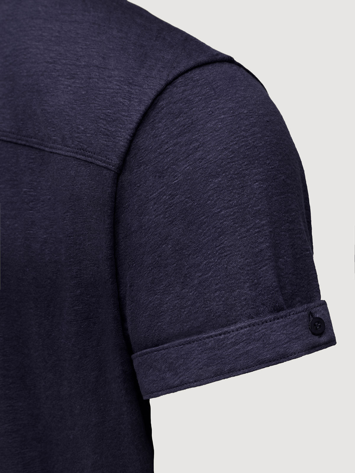 Madeira French Linen Short Sleeve Polo in *Midnight Blue* (navy blue) — sleeve cuffed detail | Y.Chroma