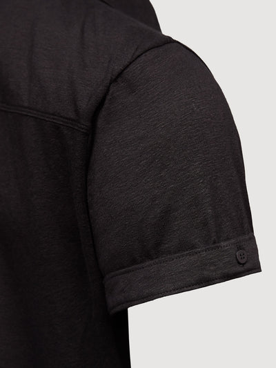 Madeira French Linen Short Sleeve Polo in *Berlin Black* (black) — sleeve cuffed detail | Y.Chroma