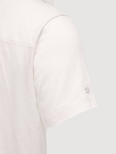 Madeira French Linen Short Sleeve Polo in *White Lotus* (off-white) — sleeve uncuffed detail | Y.Chroma