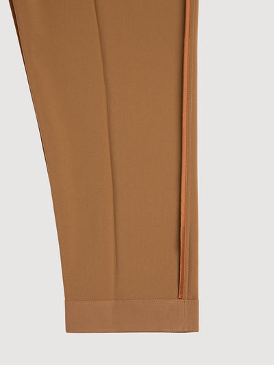 Retinol Pant 2026 Edition in *Dark Soybean* (camel) — interior leg with Cognac Silk™ lining detail | Y.Chroma