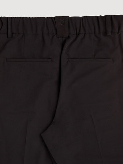 Retinol Pant 2026 Edition in *Berlin Black* (black) — back waistband and side pockets detail | Y.Chroma