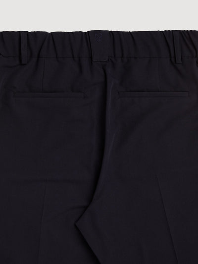 Retinol Pant 2026 Edition in *Midnight Blue* (navy blue) — back waistband and side pockets detail | Y.Chroma