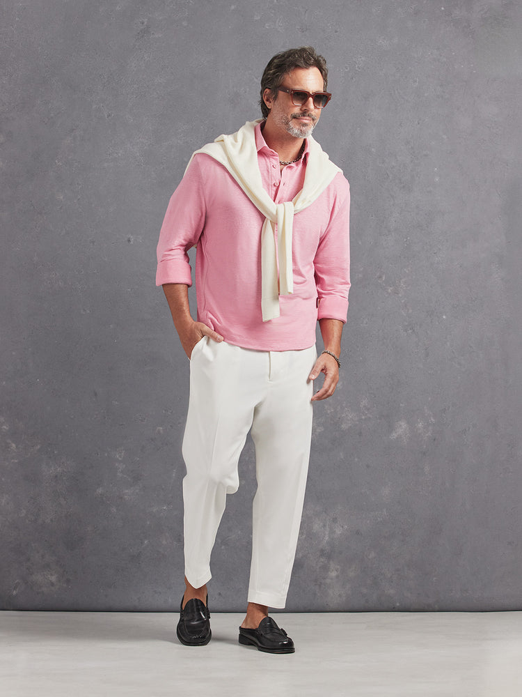 Madeira French Linen Long Sleeve Polo in *Quartz Pink* (dusty pink) styled with White Lotus Retinol Pant and White Lotus Dwayne V-Neck Cashmere Sweater on shoulders — full length lookbook | Y.Chroma