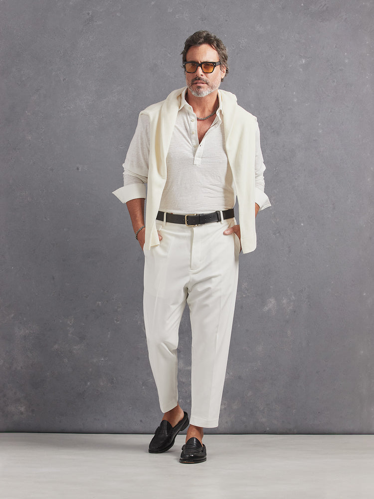 Madeira French Linen Long Sleeve Polo in *White Lotus* (off-white) styled with White Lotus Retinol Pant and White Lotus Dwayne V-Neck Cashmere Sweater on shoulders — full length lookbook | Y.Chroma