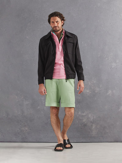 Madeira French Linen Short Sleeve Polo in *Quartz Pink* (dusty pink) styled with Basil Becker Short and Berlin Black Drücken Track Jacket — full length lookbook | Y.Chroma