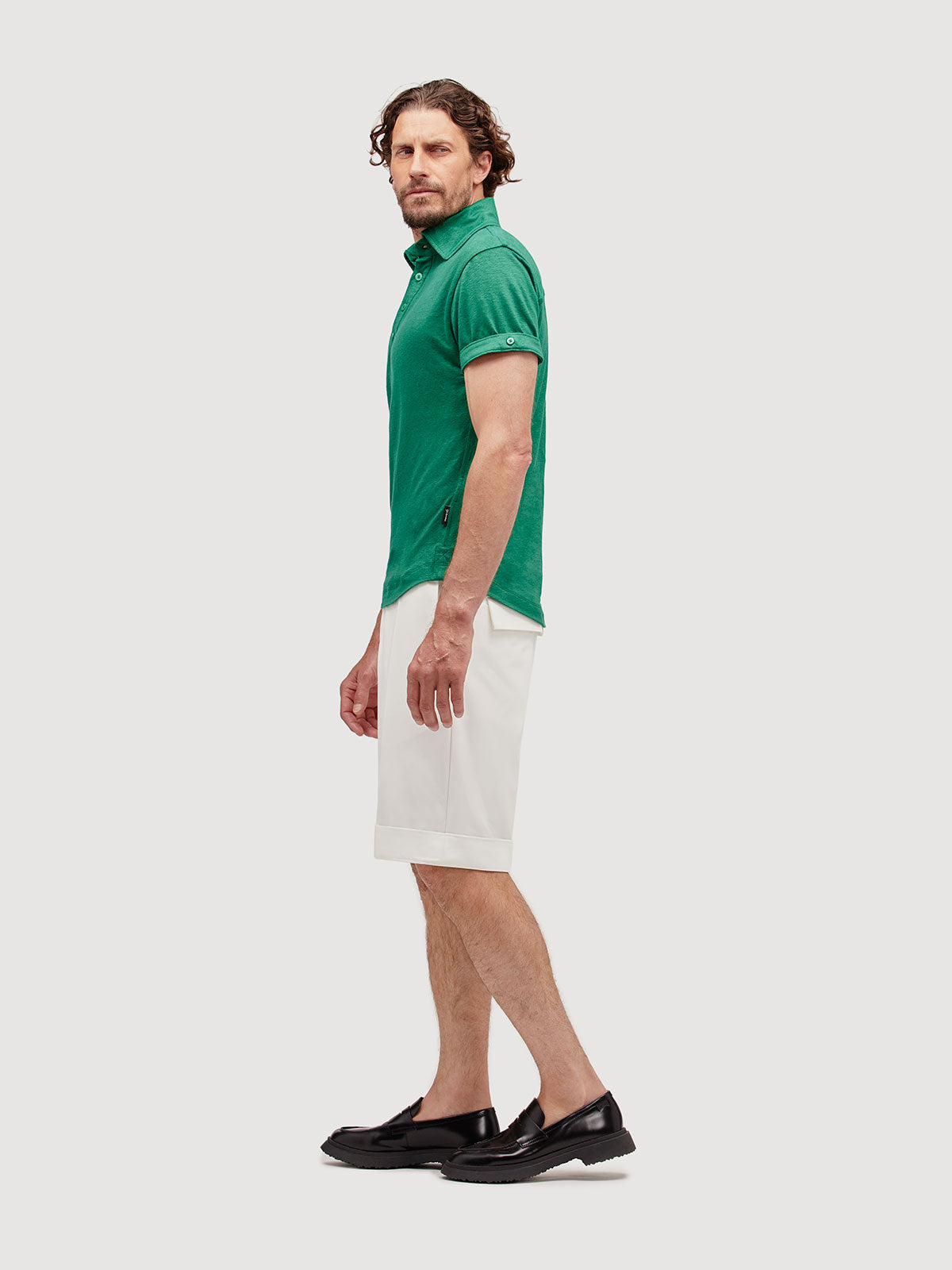 Madeira French Linen Short Sleeve Polo in *British Green* (forest green) — side view | Y.Chroma