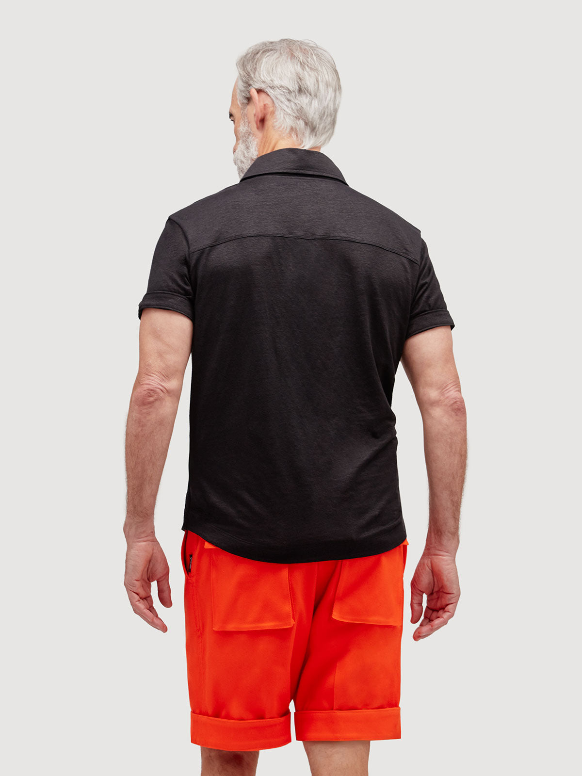 Madeira French Linen Short Sleeve Polo in *Berlin Black* (black) — back detail view | Y.Chroma