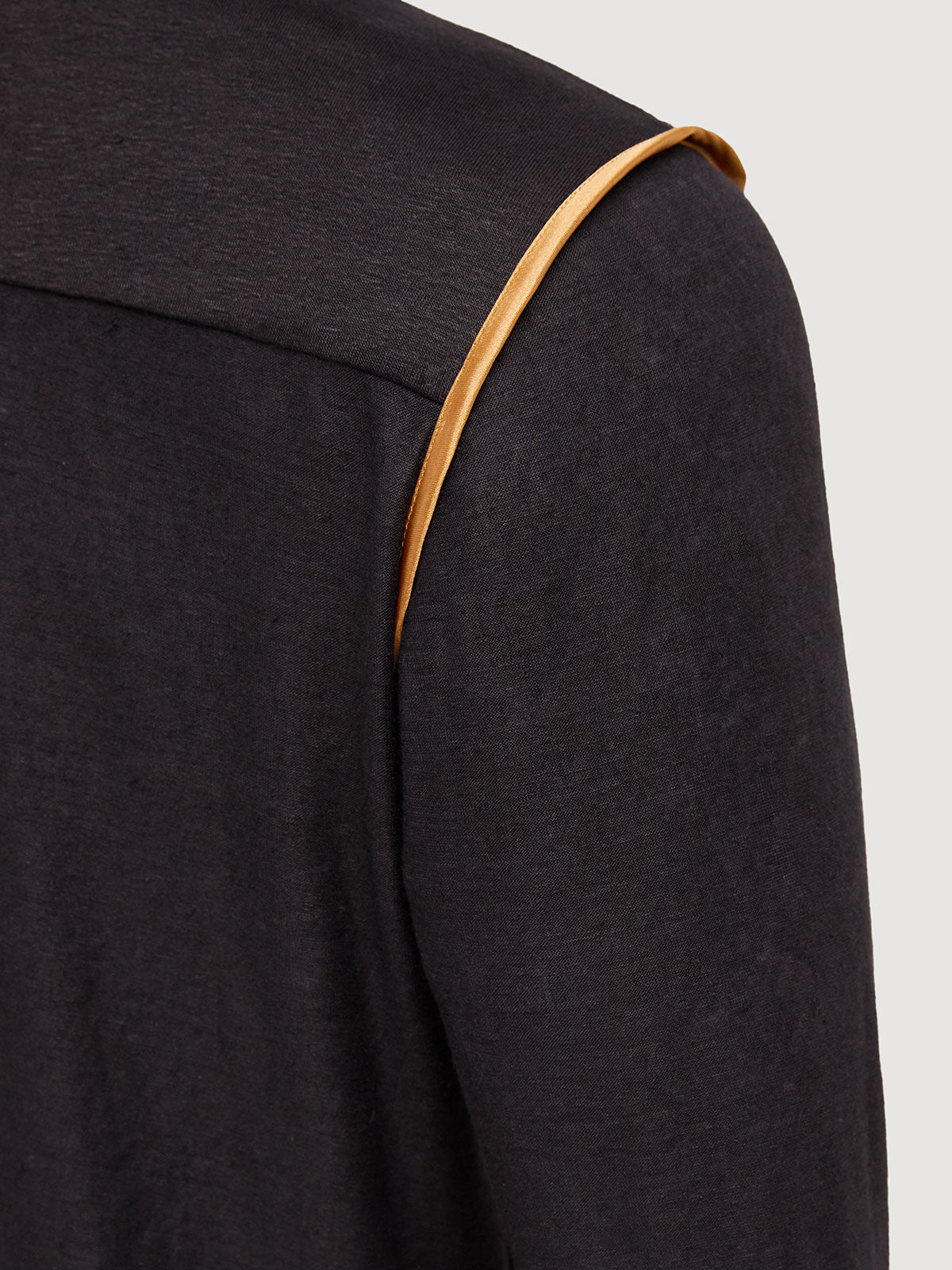 Madeira French Linen Long Sleeve Polo in *Berlin Black* (black) — Cognac Silk™ armhole lining detail | Y.Chroma