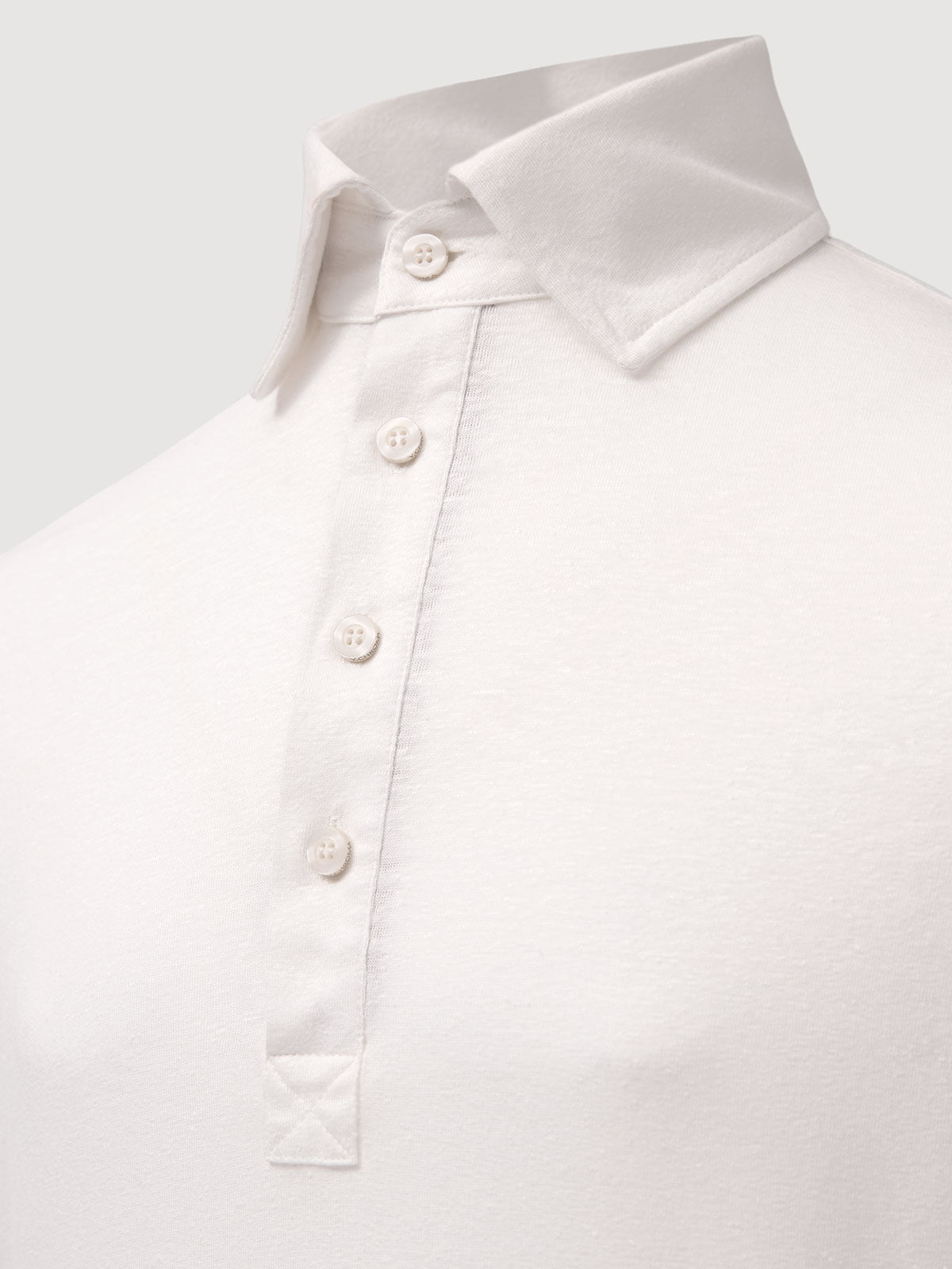 Madeira French Linen Long Sleeve Polo in *White Lotus* (off-white) — collar and front buttons detail | Y.Chroma