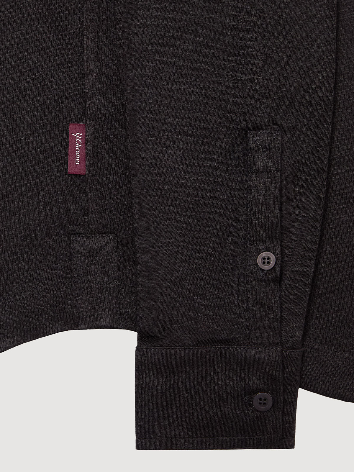 Madeira French Linen Long Sleeve Polo in *Berlin Black* (black) — uncuffed sleeve button detail | Y.Chroma