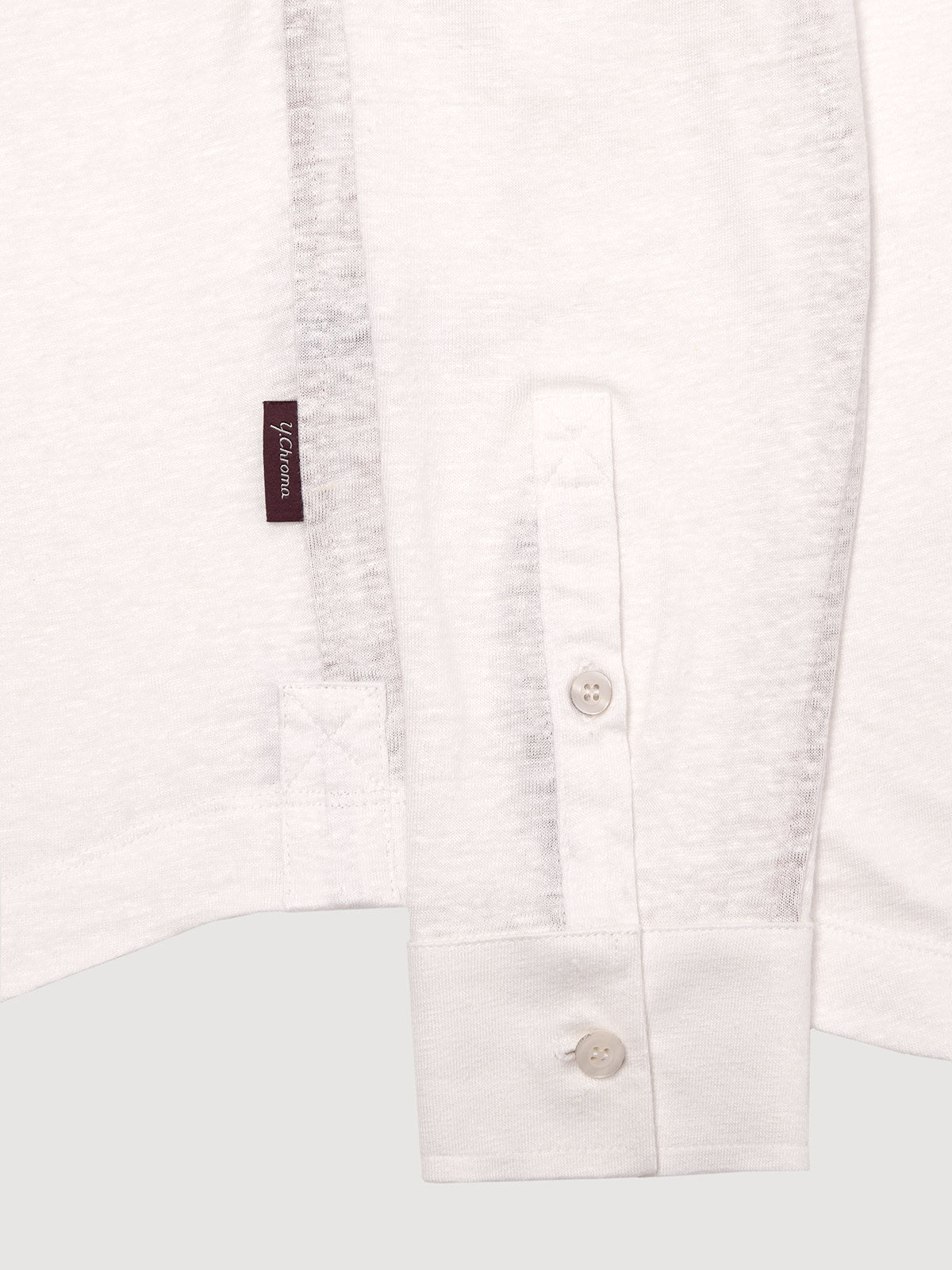 Madeira French Linen Long Sleeve Polo in *White Lotus* (off-white) — uncuffed sleeve button detail | Y.Chroma