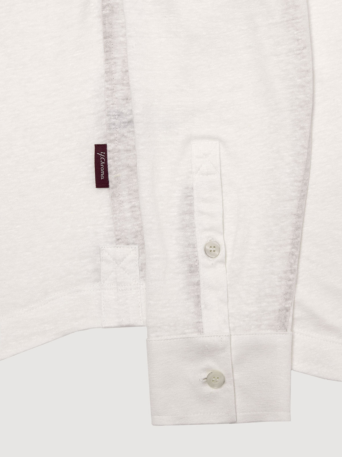 Madeira French Linen Long Sleeve Polo in *White Lotus* (off-white) — uncuffed sleeve button detail | Y.Chroma